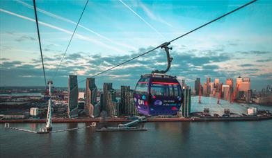 IFS Cloud Cable Car passing over Greenwich Peninsula in front of The O2 arena