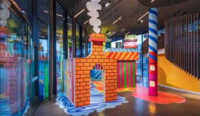 NOW Gallery's 2024 Design Commission sees the gallery space transformed into a vibrant, colourful and interactive installation that tells the story of