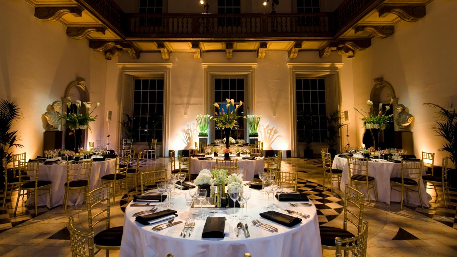 Tables set up for an evening event at the Queen's House in Greenwich.