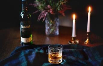 Cosy up by the fire at the Coach and Horses and enjoy a whisky for two...