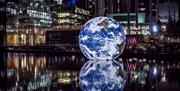 Floating Earth, a magical globe by artist Luke Jerram will be floating in the water of Middle Dock