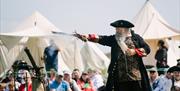 A weekend of living history as the Old Royal Naval College is overrun with pirates!
