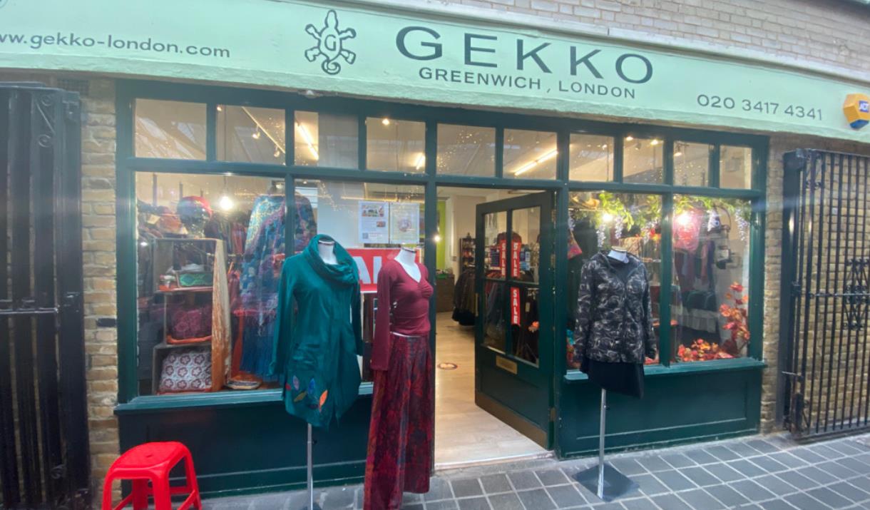 Outside GEKKO in Greenwich, showing a green shop front with a range of clothing on show. Outside GEKKO in Greenwich, showing a green shop front with a range of clothing on show.