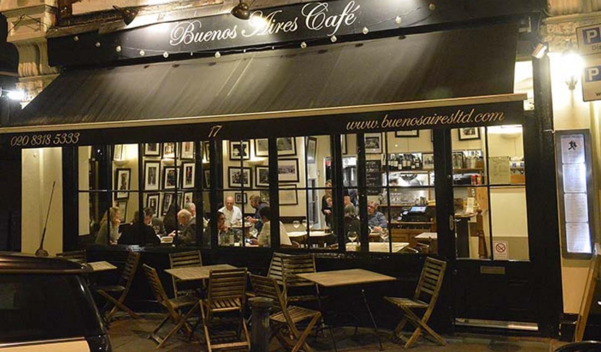 Buenos Aires Cafe, Blackheath entrance is lit up well with brown frame and big windows looking outside. Outside seating available as well. Buenos Aires Cafe, Blackheath entrance is lit up well with brown frame and big windows looking outside. Outside seating available as well.